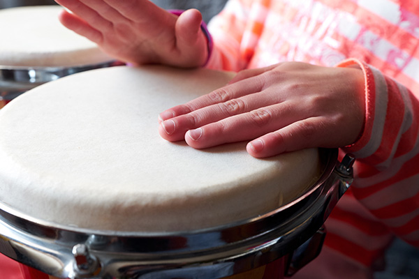 Child playing drums